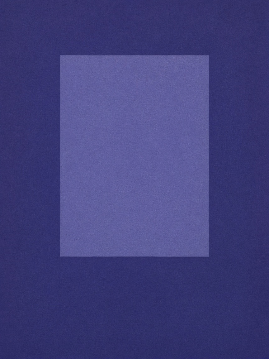 Photograph of a matte indigo panel with a lighter violet rectangle.